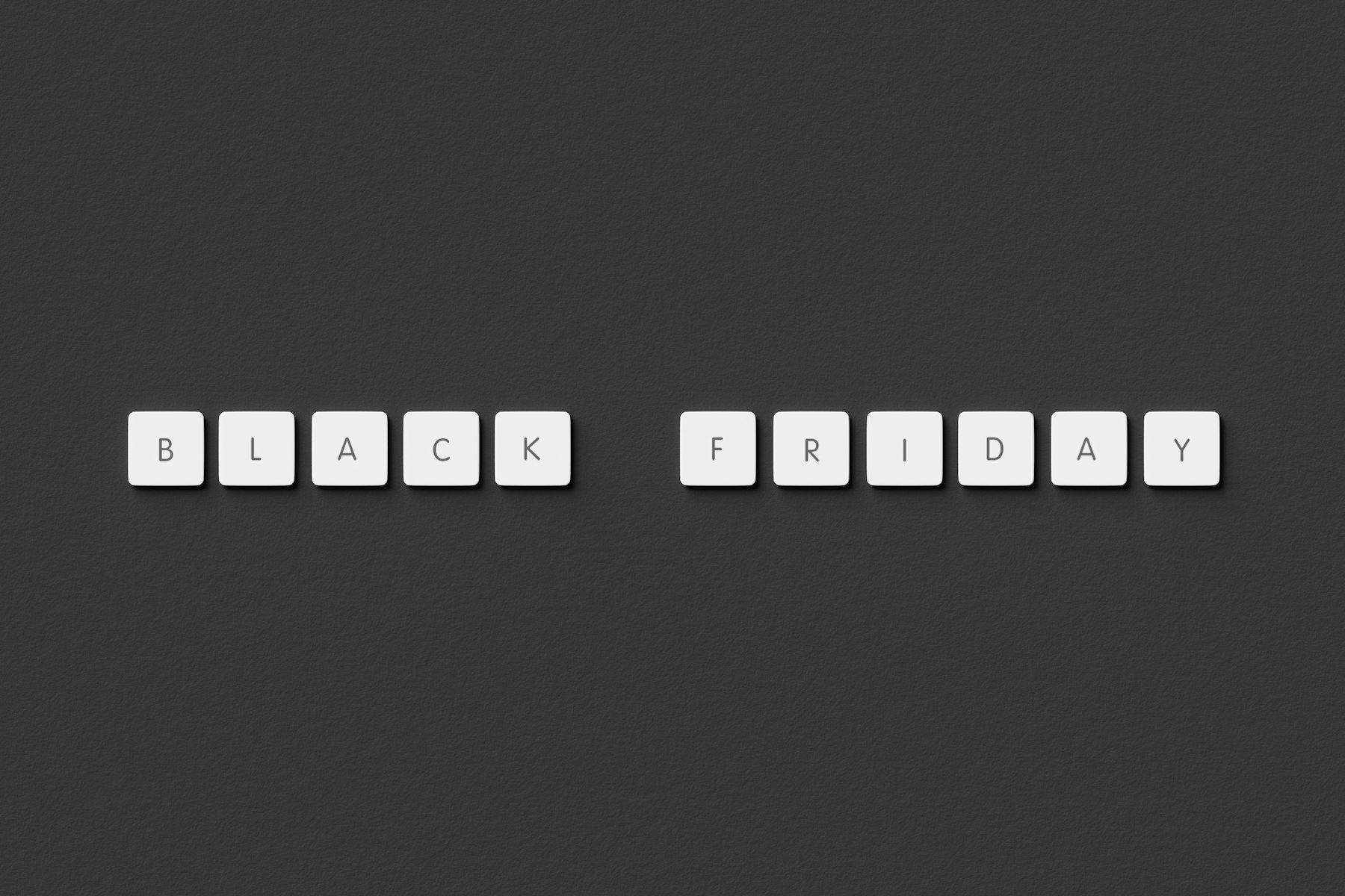 Keyboard keys spelling Black Friday on a dark grey background